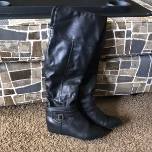 Knee high black wedge boots